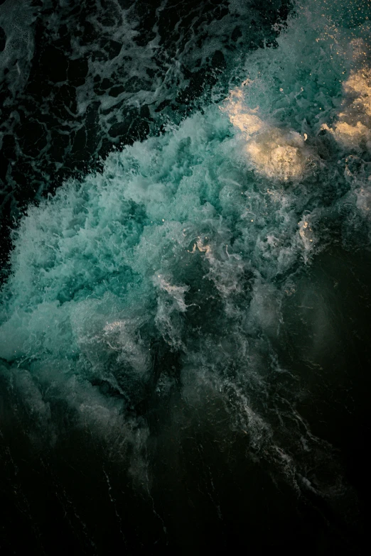 waves and blue ocean water, viewed from above