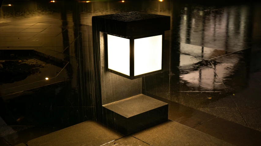 a street light in the middle of a tiled walkway