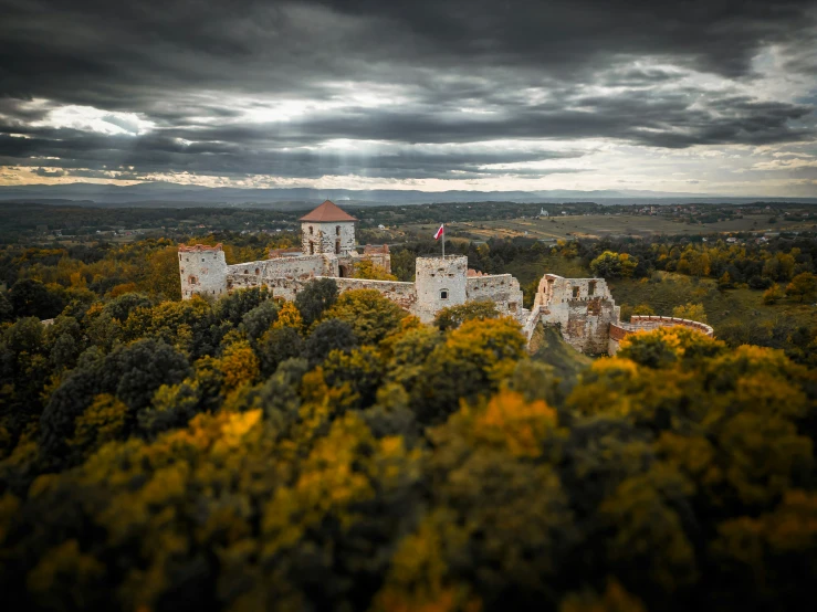 a bird's - eye view of an old building near some trees