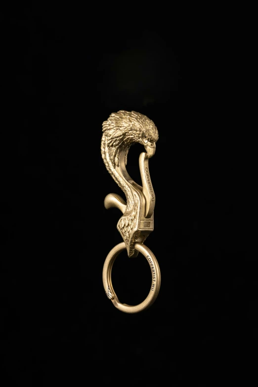 a ring is shown in gold with a snake