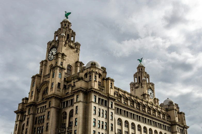 the old buildings have clocks on the top and sides