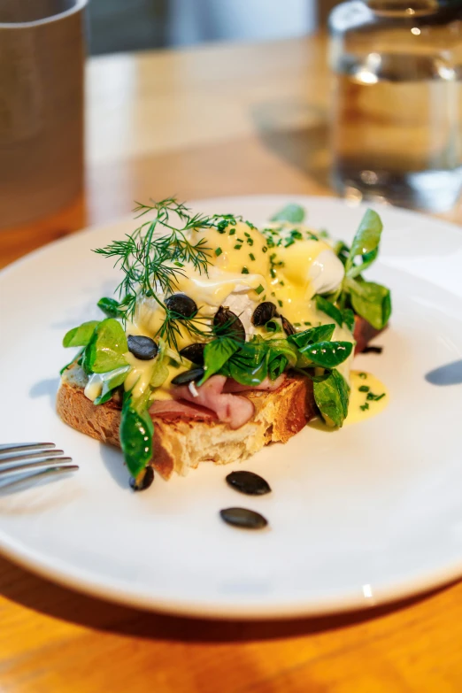 this is an image of a piece of toast with a salad on it