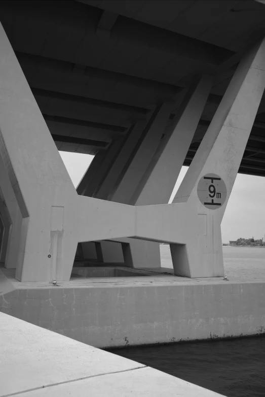 a bridge has two benches near the edge of it