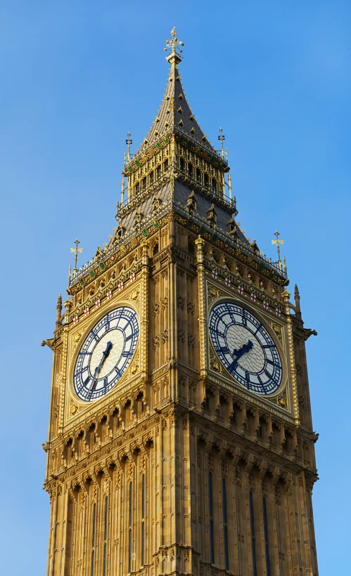 a tall tower with two clocks on each of it's sides
