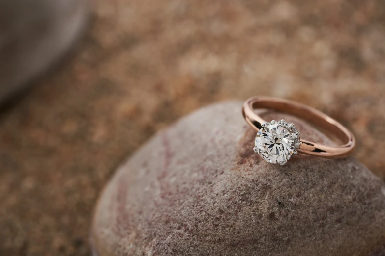 a close up of a ring with diamond in it