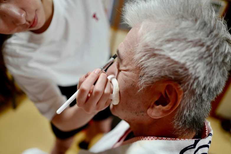 an older man has on a pair of glasses