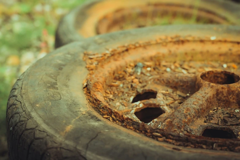 a close up of a tire with dirt on it