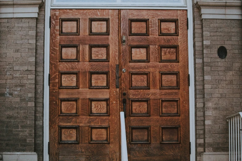 a brown door sits outside the house