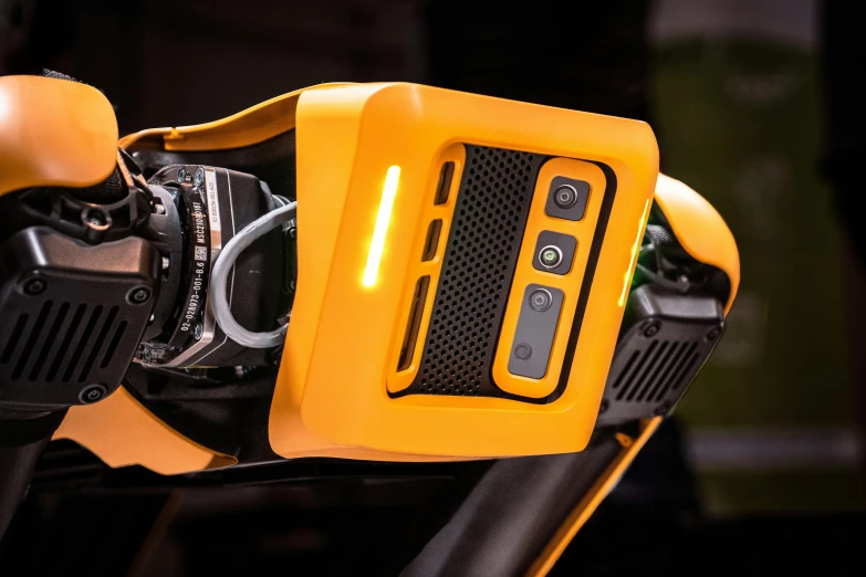 an electronic device attached to the handle bars of a motorcycle