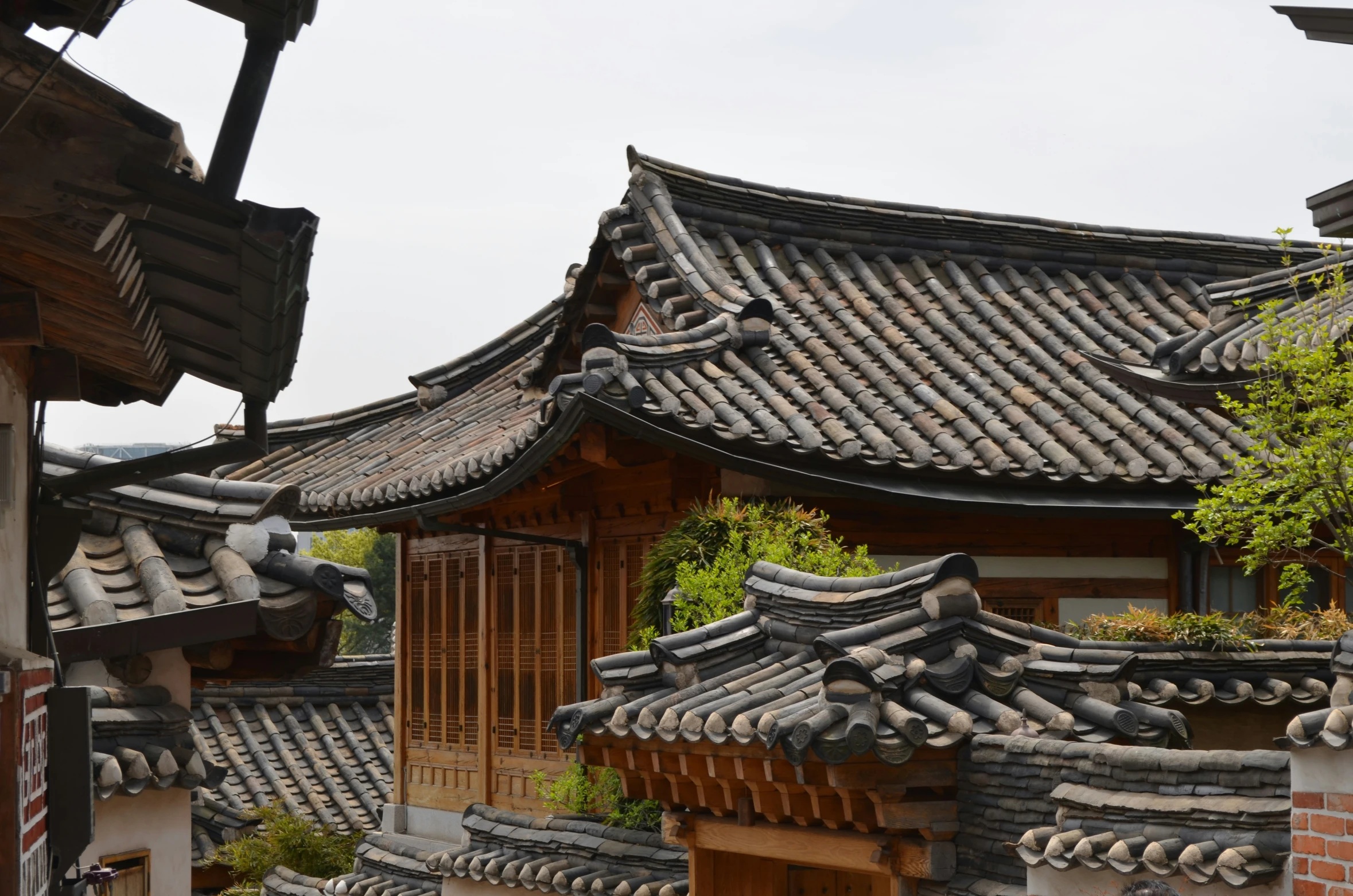 the roofs and chimneys of an old asian house