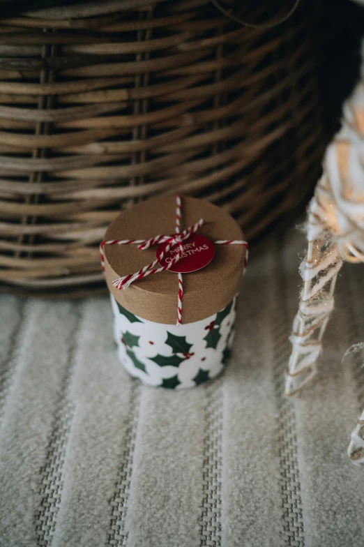 a cup with a red christmas heart inside