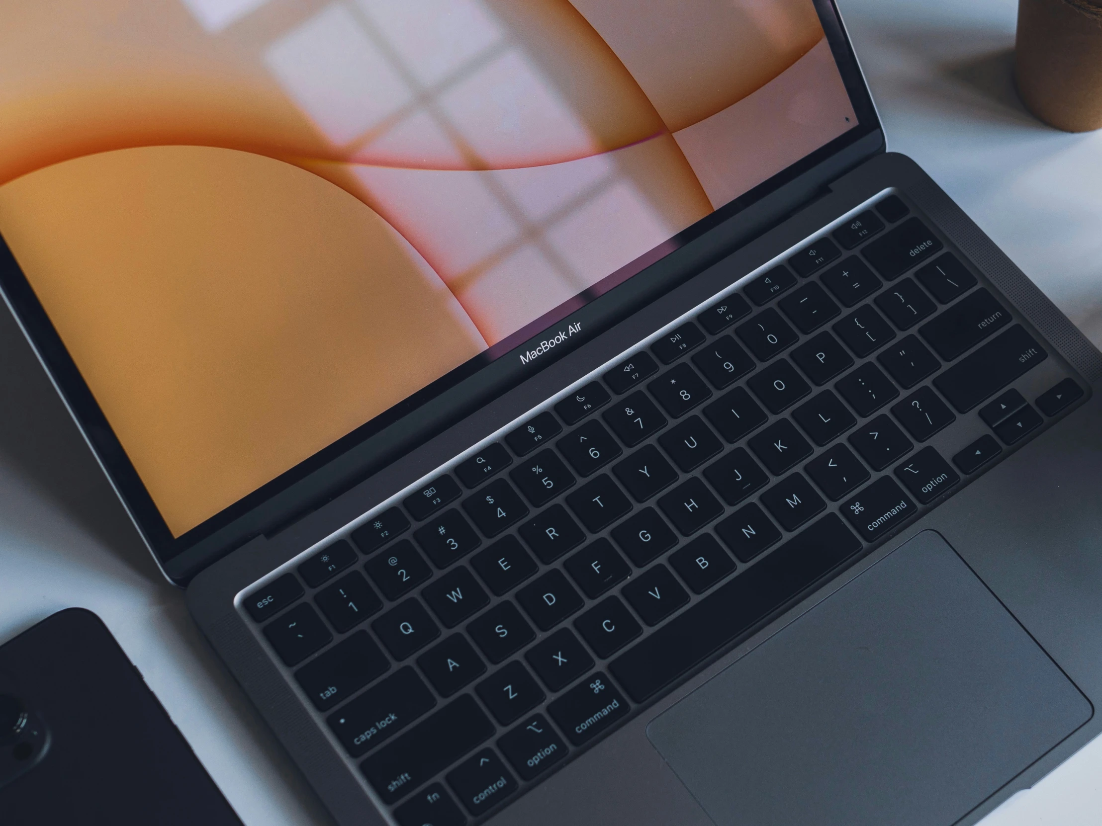 a laptop computer sits on top of a desk