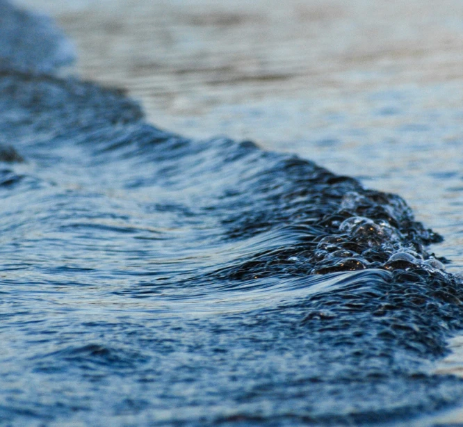 a view of the ocean waves rolling in from the water