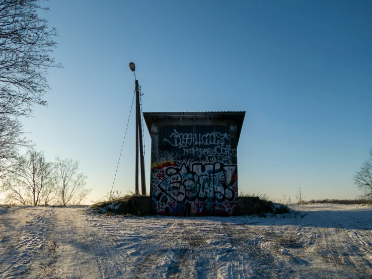 a small building that has some writing on it