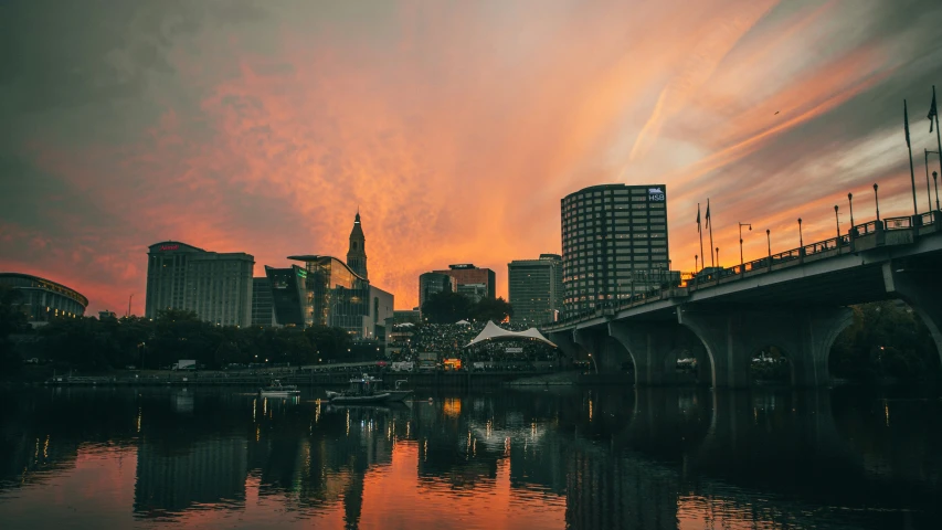 a view of a city at sunset as the sun sets