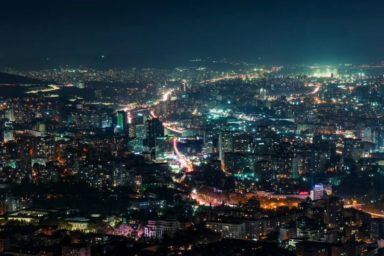 a large city at night, filled with lights