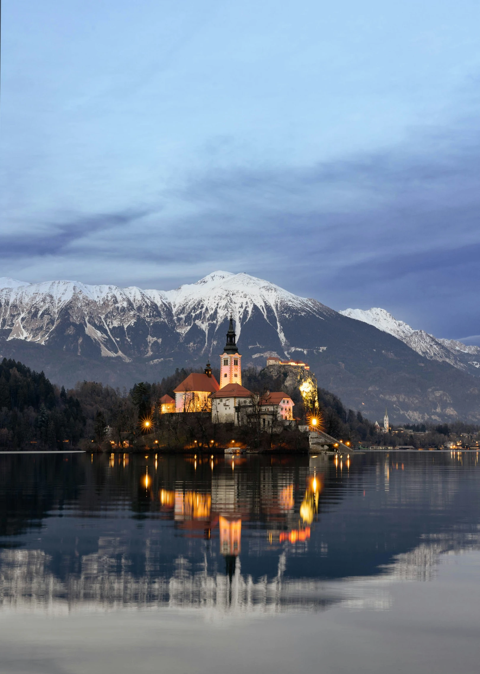 a castle is shown sitting in the middle of a lake