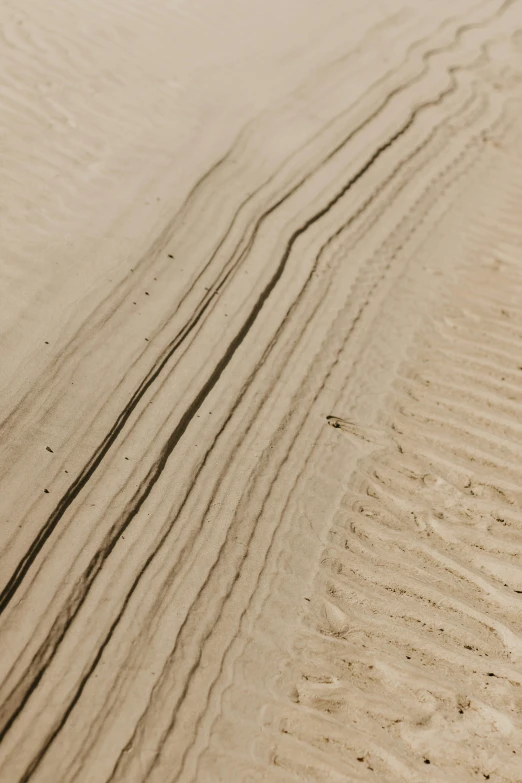 an image of a person in the sand in the desert