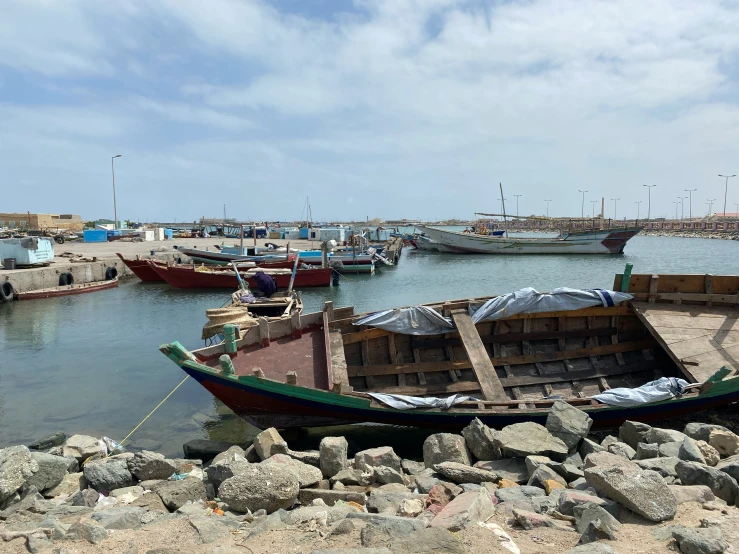 several boats docked in a body of water