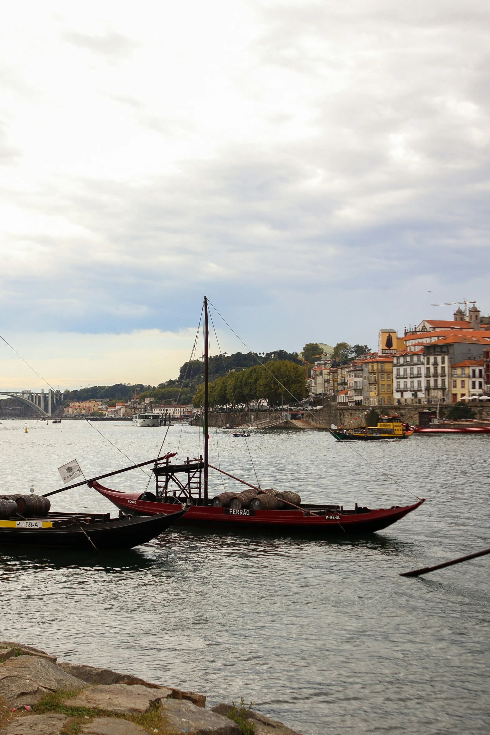 there is a small sail boat on the lake