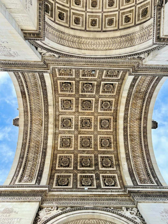 looking up at the architecture of an old, elaborate building