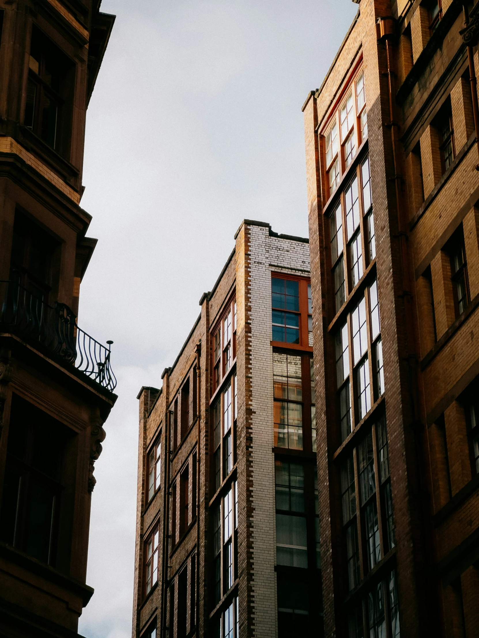 buildings sitting in front of the sky