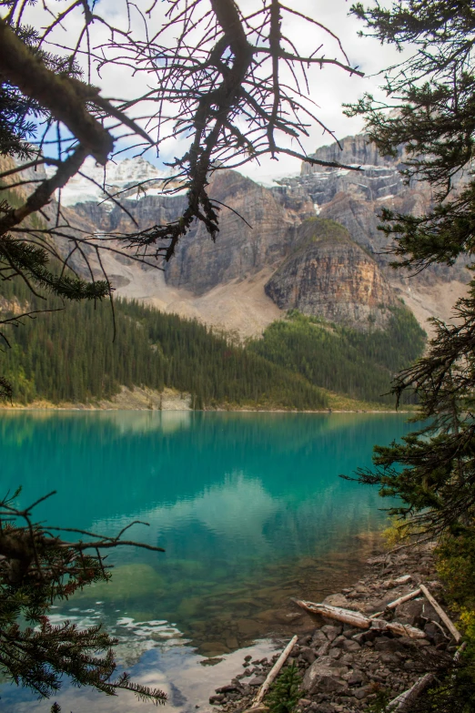 a lake is nestled among a mountain range