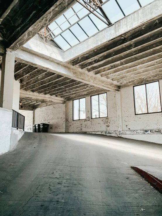 an empty building with a white fire hydrant on it