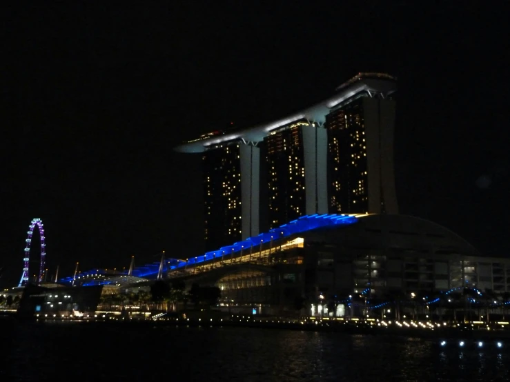 the lights on top of some buildings are bright