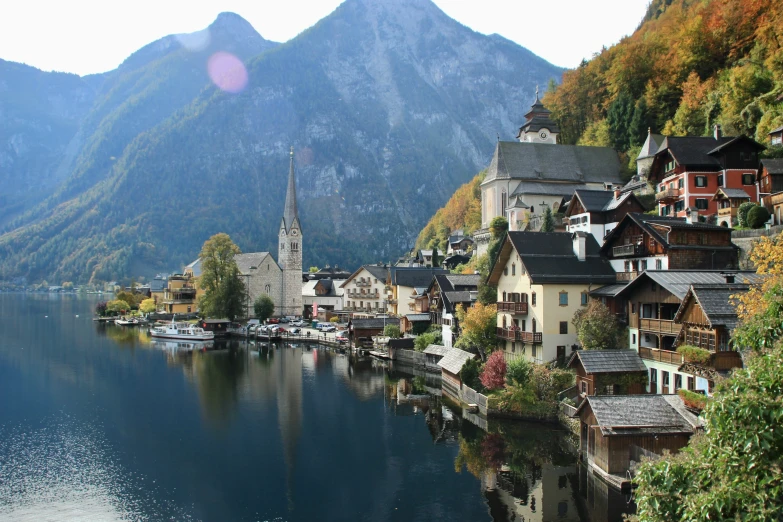 a town is on a mountain with mountains