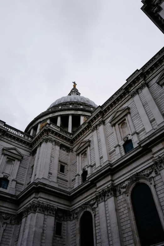 a very tall building that has a domed roof