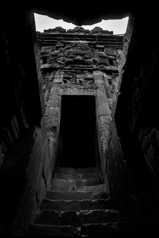 an image of looking up through an old structure