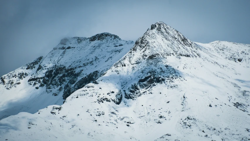 there are two mountains covered in snow