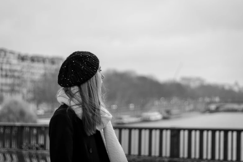 a person with long hair and a hat