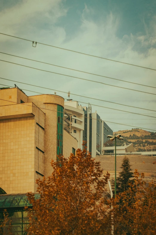 two buildings and power lines in a city