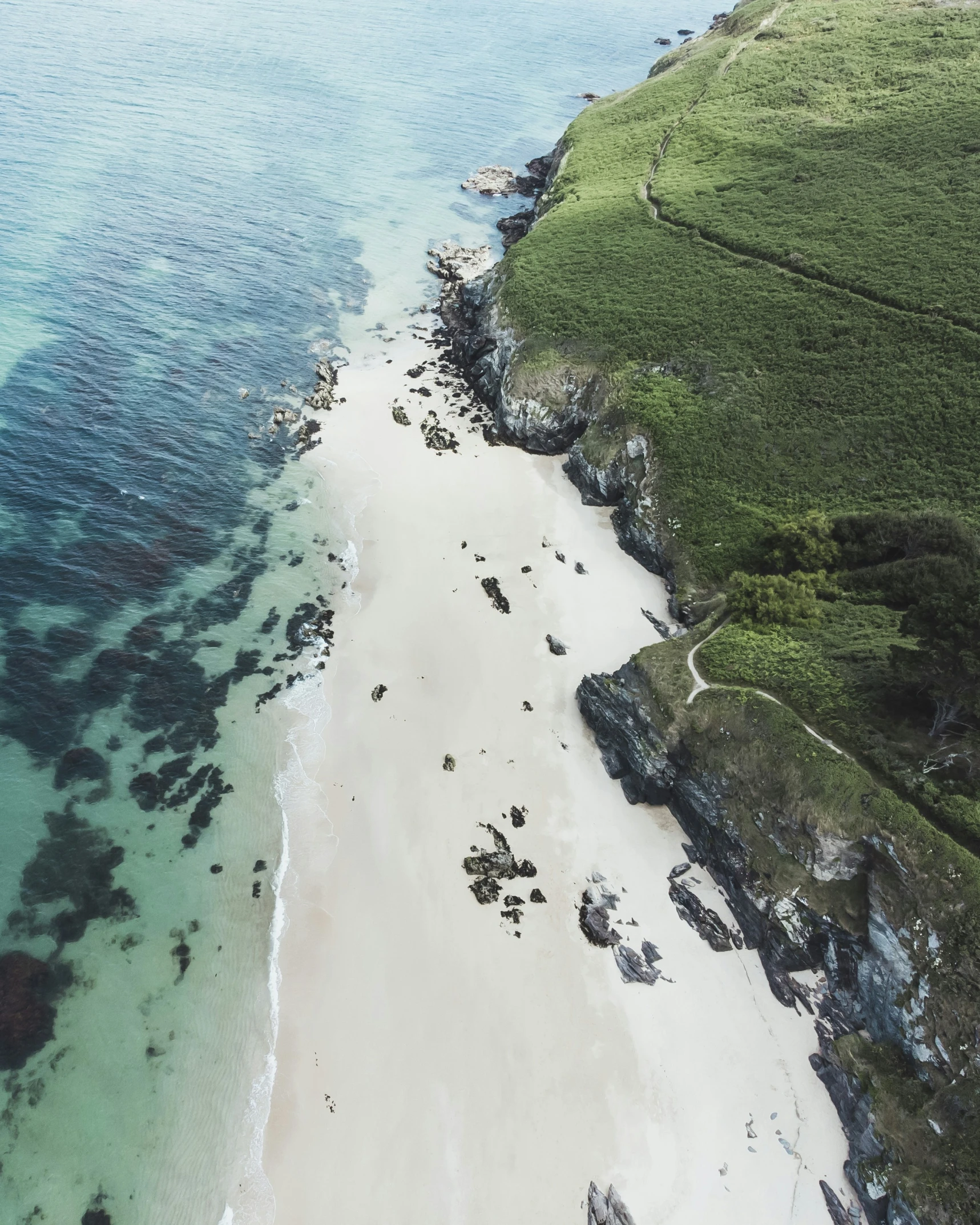 a bird's - eye view of a sandy beach