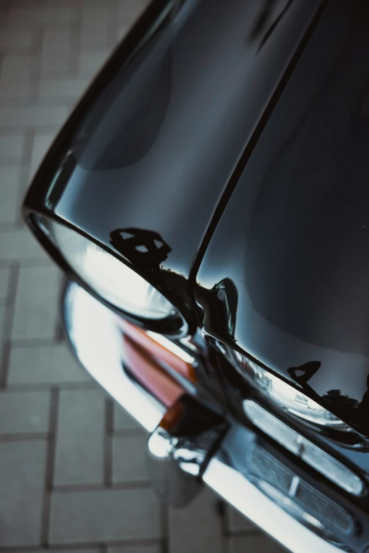 close up of an elegant shiny chrome, black sports car