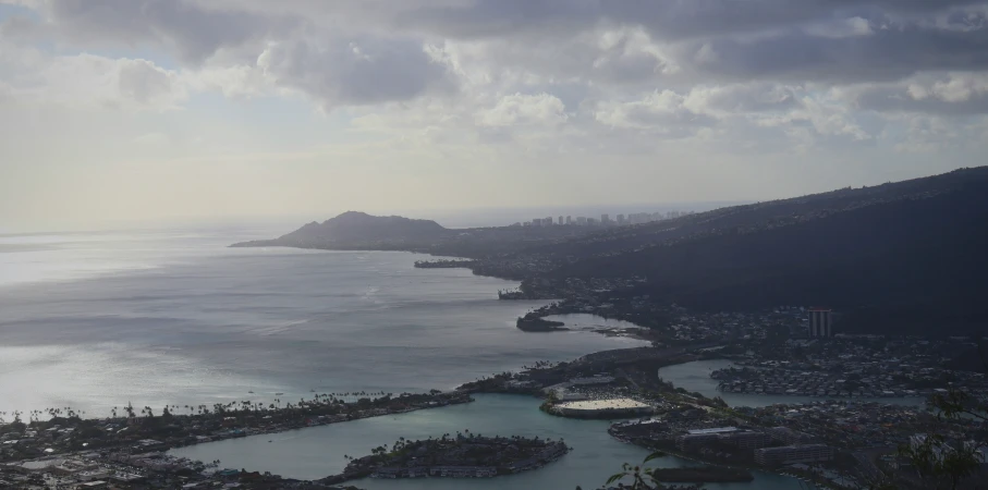 a large body of water that has a lot of clouds over it