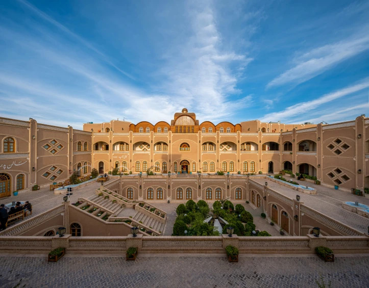 a large stone building with a lot of windows