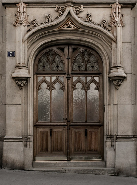 two big wood doors sitting next to each other