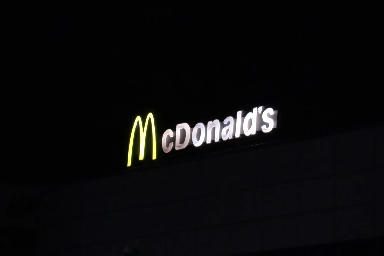 mcdonalds lit up in the dark in the darkness