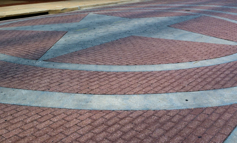 a skateboard is sitting on the side walk