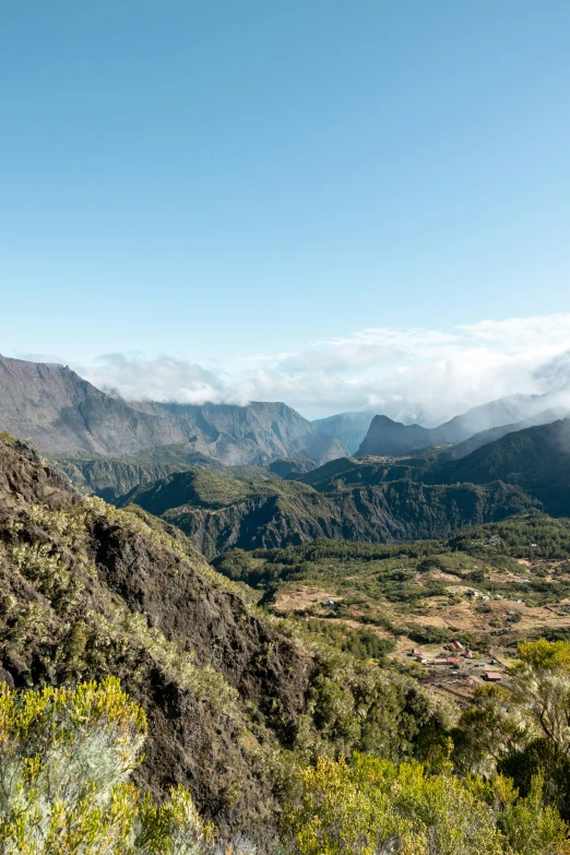 a valley with a mountain in the background