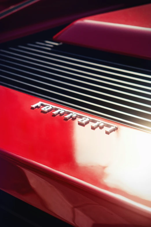 close up of a car emblem and tail light