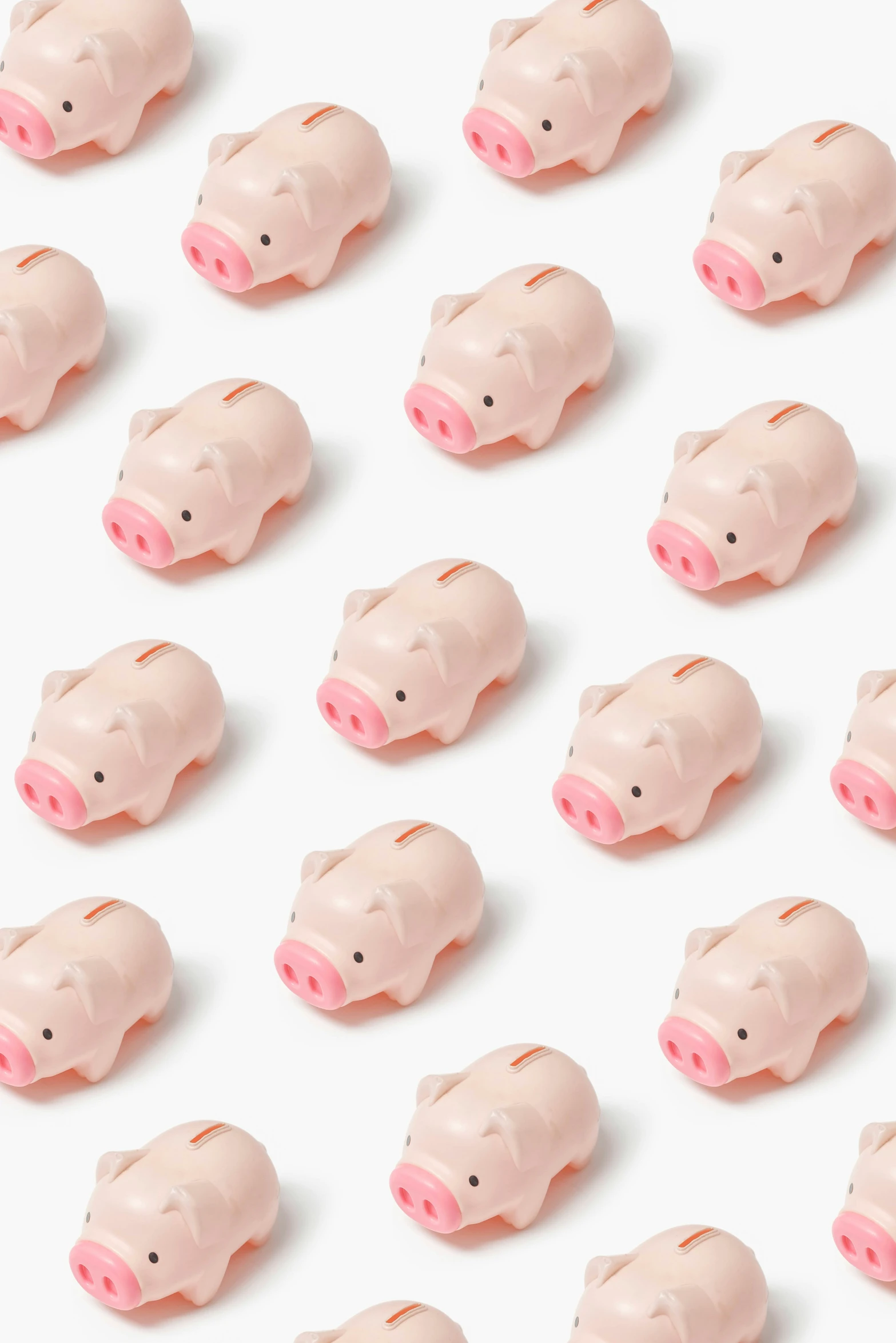 many small pig shaped plastic objects lined up