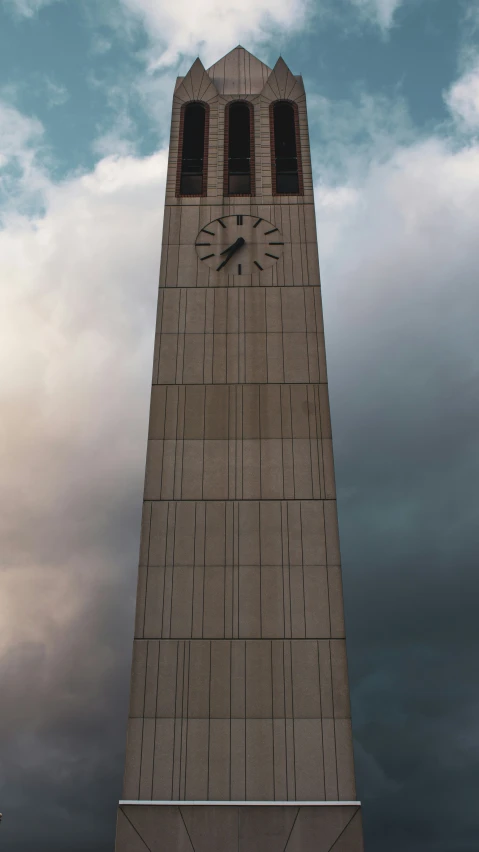 a large building has a clock at the top