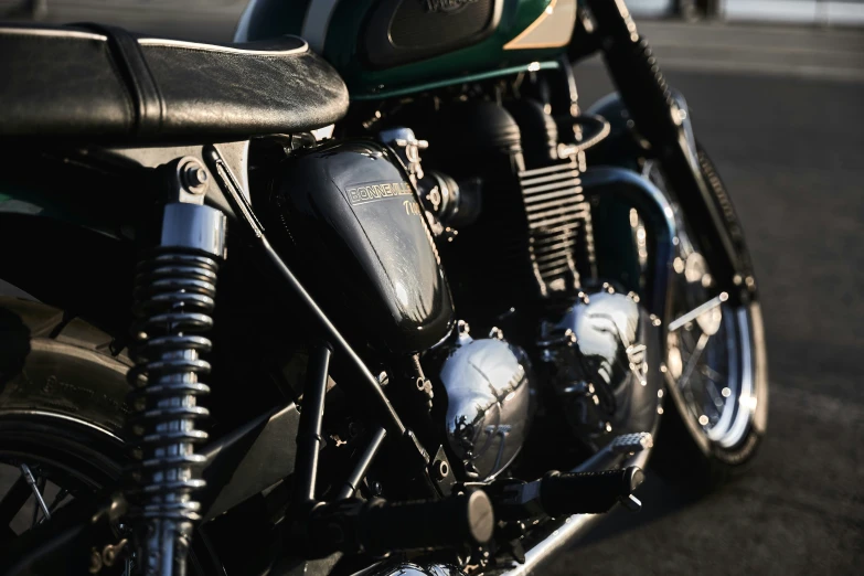 the front end of an old fashioned motorcycle