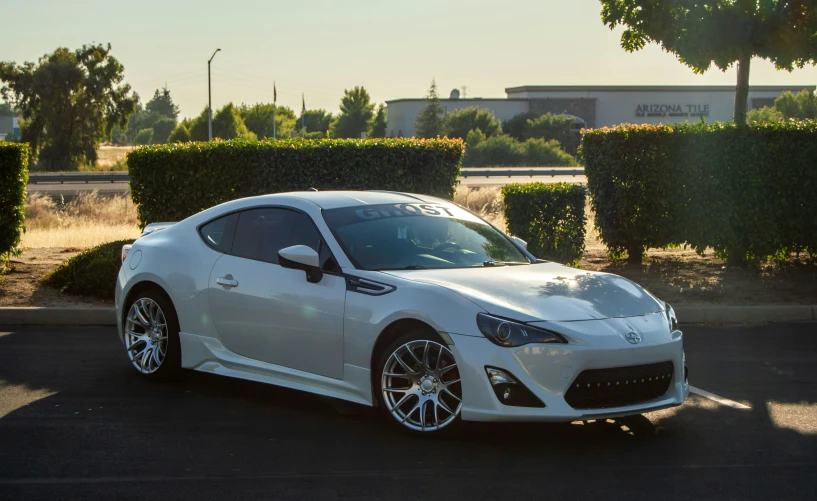 a sports car parked on the side of the road