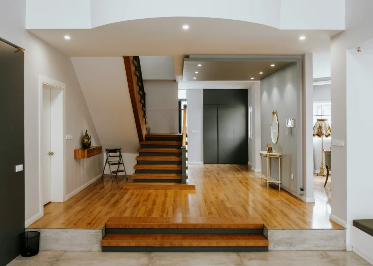 a wooden staircase and wooden steps in a house