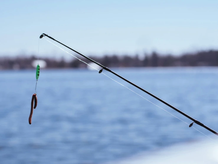 a hook that is holding on to the side of a boat